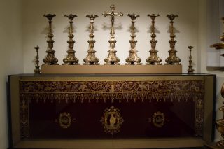 Cover for the main altar, 16th century and set of 8 chandelabrums and central cross for the same spot, 18th century
